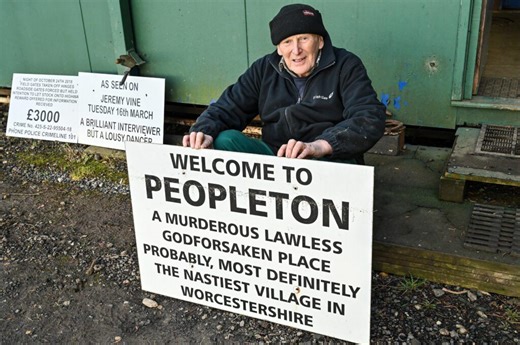 Angry farmer in fresh row over 15ft sign slagging off 'nastiest village'