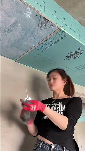 Female carpenter installing a light steel suspended ceiling.#usashorts #woodworking #beautifultools