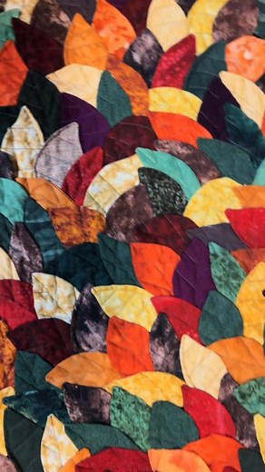 This beautiful quilt I call “Leaf Litter”. With all the layers together it is very heavy! It was so tedious I can’t see myself ever doing this technique again though. Video by Amber the Stitch Witch #sewing #millenialmidlifecrisis #crafting #quilting | Jennifer | Facebook