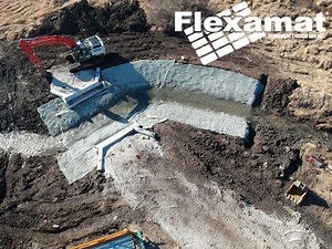 Streambank stabilization with Flexamat Plus at pedestrian bridge