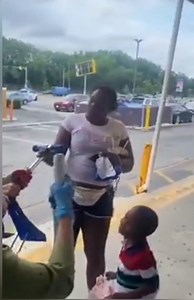 A sheboon became irate when she wasn't allowed to steal a scooter for her lil turd.