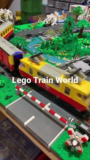 Lego train mocs in the city - the 7740 passenger train - railroad crossing - DeLorean moc