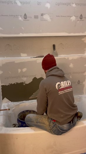 How to install herringbone around a bathtub surround. #tile #porcelain #herringbone #bathroomdesign #fbreels #diy #bathtub #rileyhomeremodel #tiktokbathroom #tiktokhome