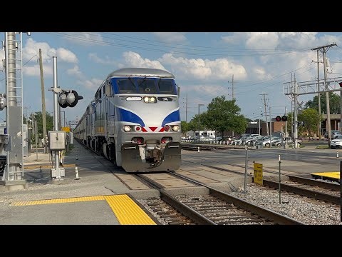 Metra 74 F59phi with a P5 horn leading a express train at Franklin Park Illinois