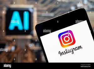 In this photo illustration, the American photo and video-sharing social networking service owned by Meta Platforms, Instagram logo seen displayed on a smartphone with an Artificial intelligence (AI) chip and symbol in the background Stock Photo - Alamy