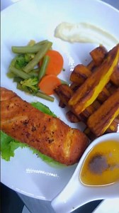 Fried plantain, delicious salmon with veggies, and spicy peppered snail A simple and flavorful meal