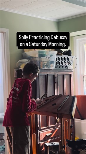 Jarrod Richey on Instagram: "I heard Clair de Lune from the other room… walked in, and there was Solomon quietly practicing Debussy on his hammered dulcimer. He bought it himself and has been teaching himself to play."