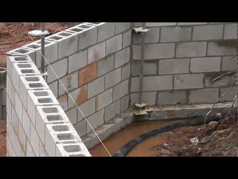 Offset angles with Masonry story poles for laying block foundation