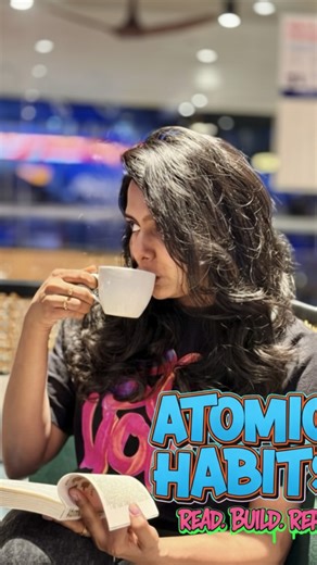 Steffi | Communication & Charisma Coach | Emcee on Instagram: "What if every walk etched a new habit? Crushed my 10k steps today, grabbed 'Atomic Habits' en route, then savored some 'Garam chai' (Grateful to my favorite human @edwin.anthony3 for capturing this #spatial magic.)As a communication & leadership coach, I live this: Consistent strides build unbreakable presence—one step fueling influence, charisma and that executive edge you lead with💯 James Clear nails it—atomic changes compound. My