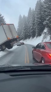 Semi-Truck Teeters on Edge of Icy Cliff Wolf Creek Pass, Colorado — November 15, 2024 A harrowing scene unfolded on a remote stretch of mountain highway Friday morning as a massive tractor-trailer lost traction on a slick, snow-covered bend. The vehicle began a slow, terrifying slide toward a steep embankment, leaving the rear of the trailer suspended precariously over a sheer drop-off. Eyewitness footage captured the moment the semi-truck’s driver struggled to regain control while several passe