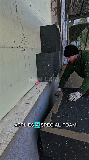 This artist installs an exterior thermal insulation system on a building wall.#shorts #construction