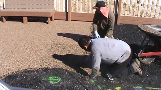 How much does a poured rubber playground cost?