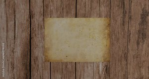 Old paper on wooden background 3d animation. Old parchment unrolling and rolling back.