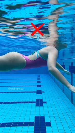 Fix your sinking legs in swimming. Engage your core. Swimming streamline body position.