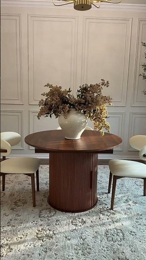 This extendable dining table with hidden storage is perfect if you need extra space - link in bio.