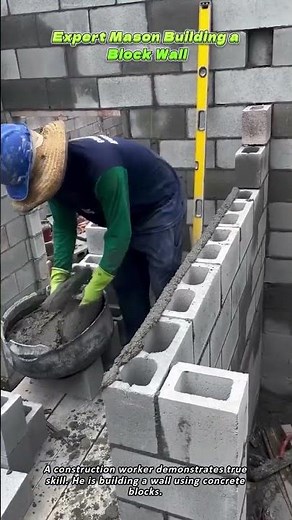 Expert Mason Building a Block Wall