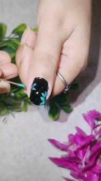 Bold Black Nails with Elegant Green Leaf Design 🖤💚 #nailart #trending #stunningnails