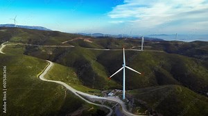 Wind turbines on hills, eco-friendly energy sources in shift to green energy