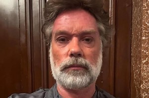 90s pop star looks unrecognisable with grey hair - can you guess who?