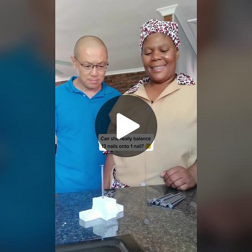 Balancing 13 Nails on 1 Nail