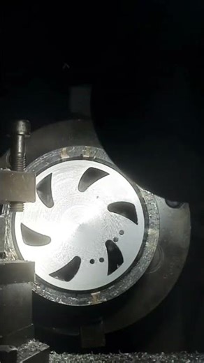 Facing and chamfering on lathe.