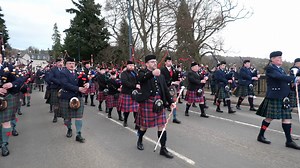 The massed bands taking part in Perth's 'Burns Take 2' parade on 26th February 2022. The parade starts from Norie Miller Park and crossed over the river Tay, heading into Perth City centre, where they joined the crowds at the main stage. The massed bands were led by Drum Major Kenny Forbes and the band s taking part were The Vale of Atholl Pipe Band, Perth & District Pipe Band, Blairgowrie, Rattray & District Pipe Band plus Methil & District Pipe Band. After a cancellation of the annual Burns Ce