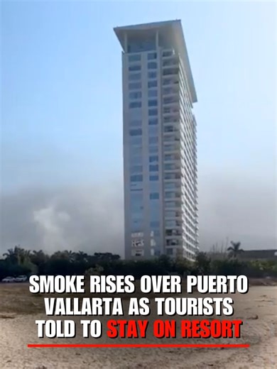 'CODE RED': Tourists in Puerto Vallarta, Mexico, were told not to leave their resort as smoke was seen filling the sky above the city as a government official warned of