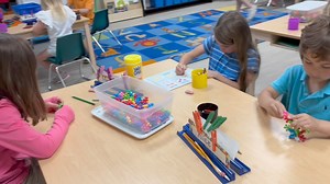 A sneak peek into a morning in kindergarten. Students are completing academic work and doing activities to build their fine motor skills while listening to hymns. We love this sweet learning environment! #westfieldkindergarten #educationofmindandheart | The Westfield School