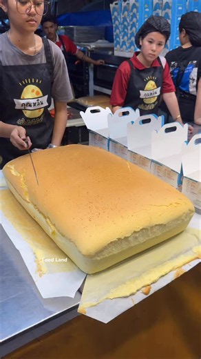 Food Land on Instagram: "Giant Egg Cake! Freshly Baked, Fluffy Delight 🍰 . Shop name: Egg cake Taiwan by คุณหลิน"