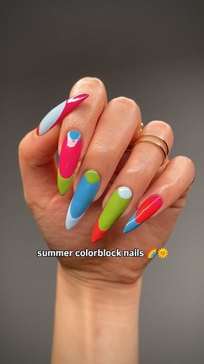 Allison on Instagram: "tutorial on this colorblock nail art design  i like putting a dot at the center line of my nail as a guiding point which helps with getting the french tips and lunala to be symmetrical, come on geometry  products used from @bkind.products (*gifted) les baby spice (light blue) pitaya (hot pink) blue lagoon (blue) haricot magique (green) coral crush (orange) #nailinspo #naildesign #bkind #summernails #colorfulnails #frenchtips"