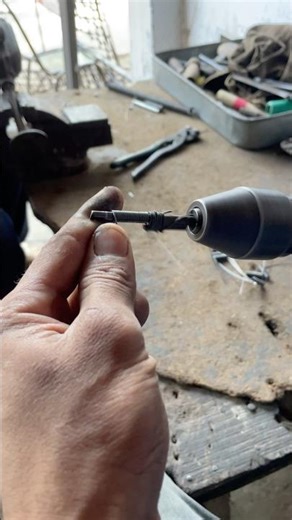This is a new simple tension spring on a Hand drill machine by hand #shortsvirl