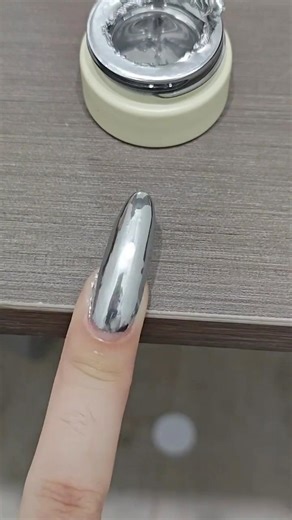 Nail art 💅 Manicure on Instagram: "🪩Silver Mirror Gel ✨ Achieve a sleek, reflective chrome finish that’s perfect for any occasion. Easy to apply, long-lasting, and stunningly glossy. 🛒Link in bio 🔗 💅 #MirrorNails #SilverChrome #NailGoals”"