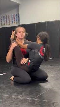Women spar during Jiu Jitsu training!