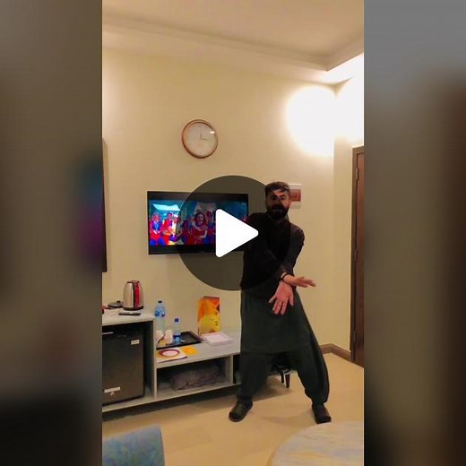 Dance Routine in a Bright Living Room Setting