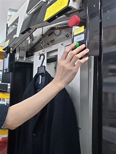 A hanging garment packaging machine engineered for plastic covering and sealing of suspended garments in laundry operations. It is developed for facilities that process garments on hangers and require consistent protective packaging. - Designed for hanger-based garment workflows - Automatic film drop and sealing integration - Sensor-based length adjustment for garment size - Supports grouped hanger packaging - Compact design with flexible installation Ideal for laundry factories and garment fini