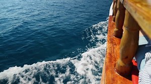 clip-1099976263-side-view-vessel-boat-ship-sailing-mediterranean