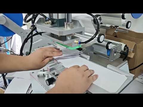 Semi auto tamp labeler for kettle wrapping card with booklet