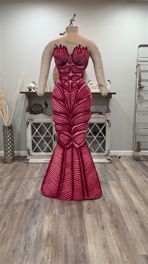 CROSS CUSTOMS & CORSETS on Instagram: "Creative evening wear for @allurathedolll This gown is so horrifyingly beautiful! The amount of patterning and stitch work involved just to get the base garment together was unreal! The phenomenal detail work with the airbrushing by @shontellesparkles truly brought the gruesome details to life! The two built in corsets the airbrushed coverup — the skin on the inside of the coverup. Oh and the HAIR! So cvntyyyyyy!!! It’s giving attack on titan meets met gala