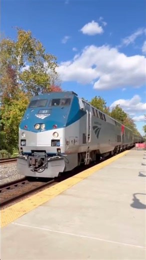 Amtrak 41 with P42DC engine #63 leading with a friendly engineer waving in the cab and horn show