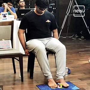 10K views · 215 reactions | 16-year-old Mohammed Aiman Koli has a world record for solving a Rubik’s Cube with feet in 15.56 seconds #AajNEWJDekhaKya | Briefly | Facebook