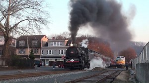 With the last trip of Santa Trains for 2017, the Central Railroad of New Jersey 113 moves close to track speed through Schuylkill Haven. This might be one of the best performances by an 0-6-0 we have seen. For this day, 113's front is lettered and numbered for the 250th Anniversary of Anthracite, complete with 250 number plate and banner. | Dynamo Productions