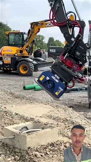 70 Plate compactor attachment operating under a Ro #automobile #excavator