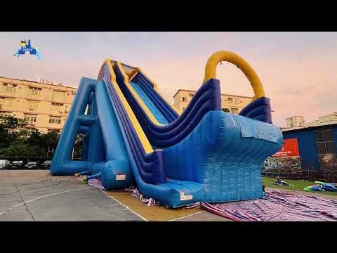 Blue-Yellow Wave Inflatable Slide: Eye-Catching Design for Immersive Summer Water Fun!