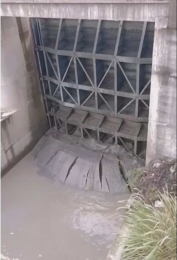 Giant Dam Gates Open: Water Rushes Through