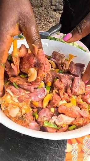 African Tribal Village Woman Traditionally Marinating Goat Meat to Cook #shortsfeed #villagecooking