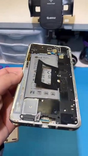 LG Phone Repair: Missing Charge Port and Broken Frame