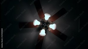 Ceiling fan circling in a dark room slowing down and speeding up.