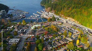 Aerial view on Horseshoe Bay, houses, nature and car queue on the ferry