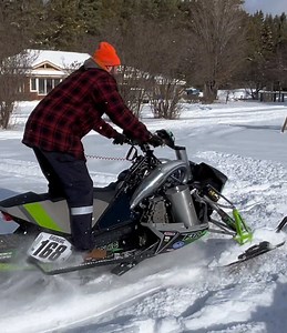 Tunnel Dump Exhaust Enhancements for Snowmobiles
