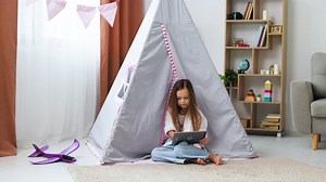 Little girl sitting on the floor | Free Stock Video Footage